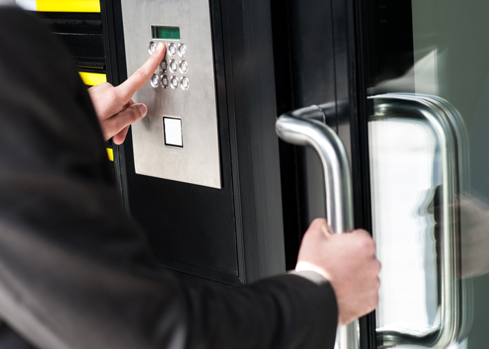 person opening security door